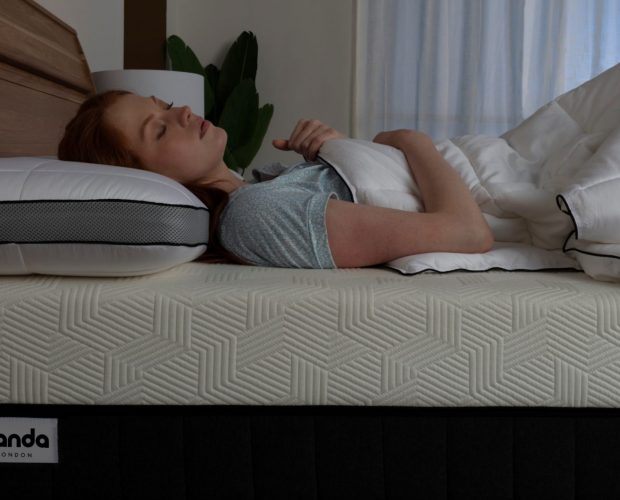 girl sleeping on a hybrid mattress