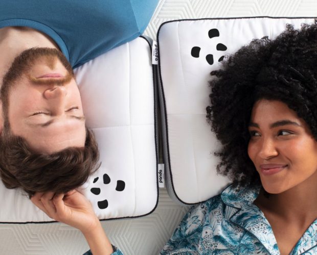 couple laying on a bamboo hybrid pillow