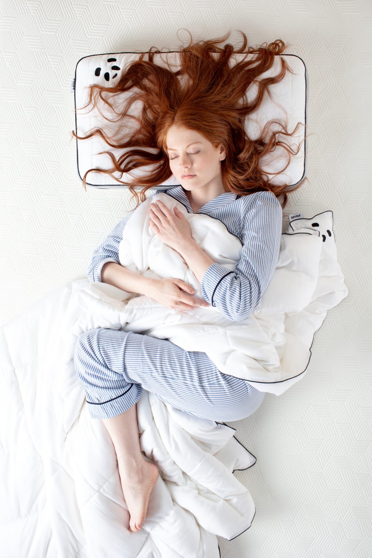 red hair girl sleeping on a Hybrid Pillow