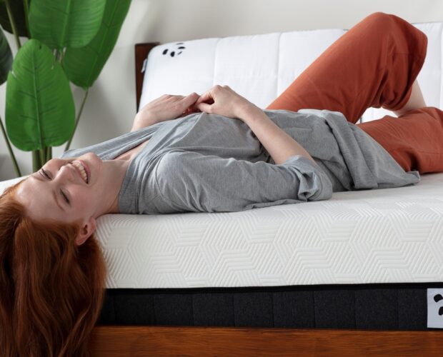 Woman laying on Hybrid Bamboo Mattress